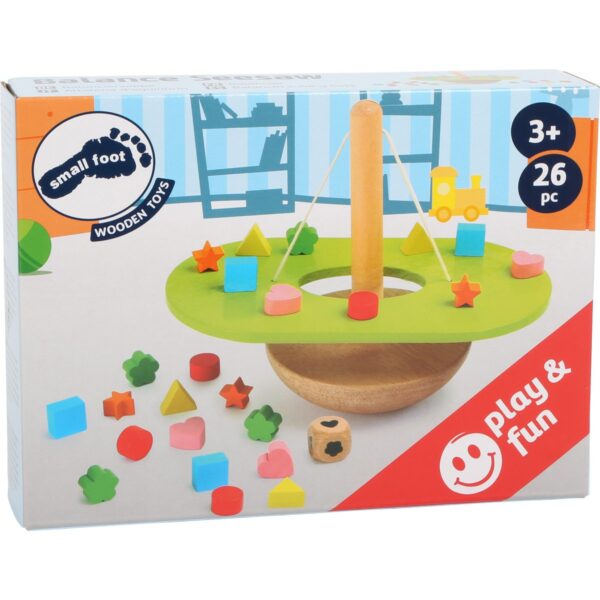 small-foot-balansspel-duurzaam-hout-doos Verpakkingsdoos met de kleurrijke, glad afgewerkte houten speelstukken van de Small Foot evenwichtstoren.